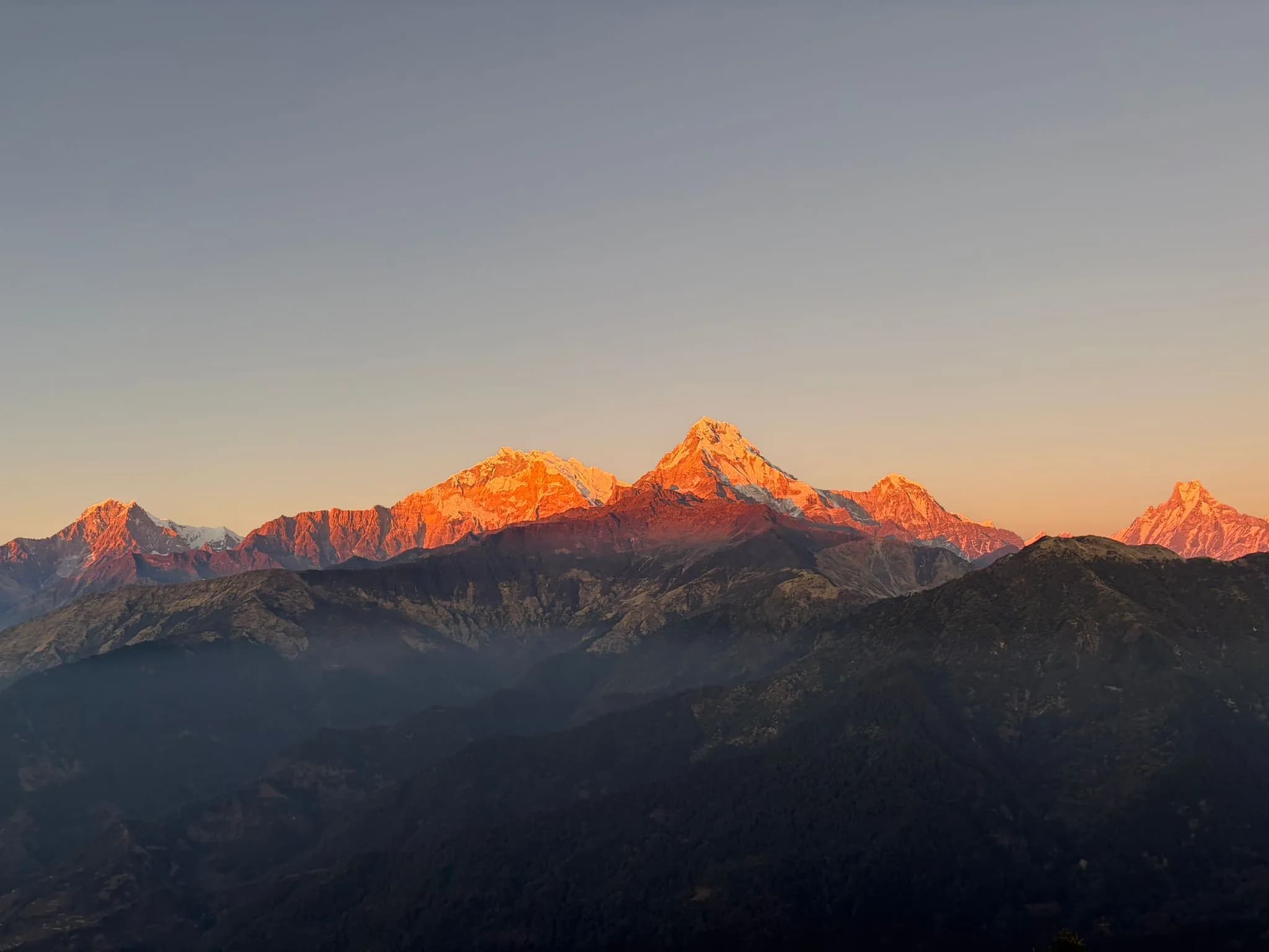 Wide-angle landscape of the Annapurna Sanctuary valley surrounded by towering 7000m peaks Wide-angle landscape of the Annapurna Sanctuary valley surrounded by towering 7000m peaks